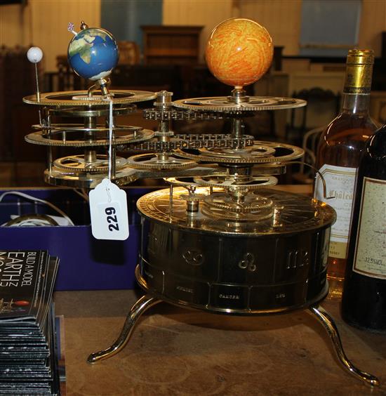 Brass orrery & magazines